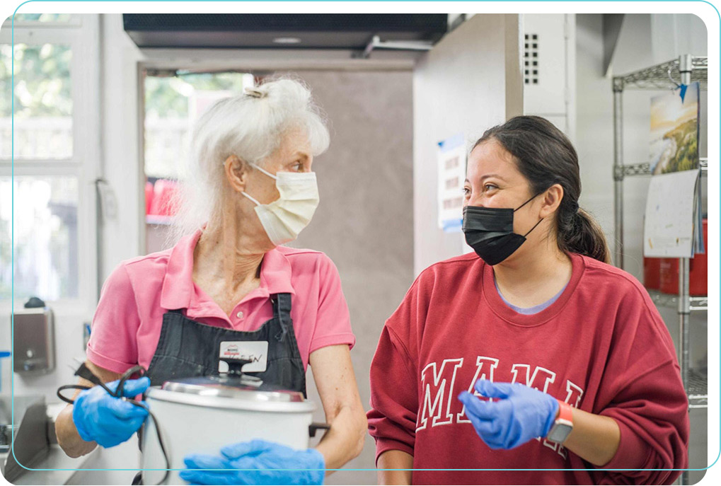 Volunteers in the kitchen at NoHo