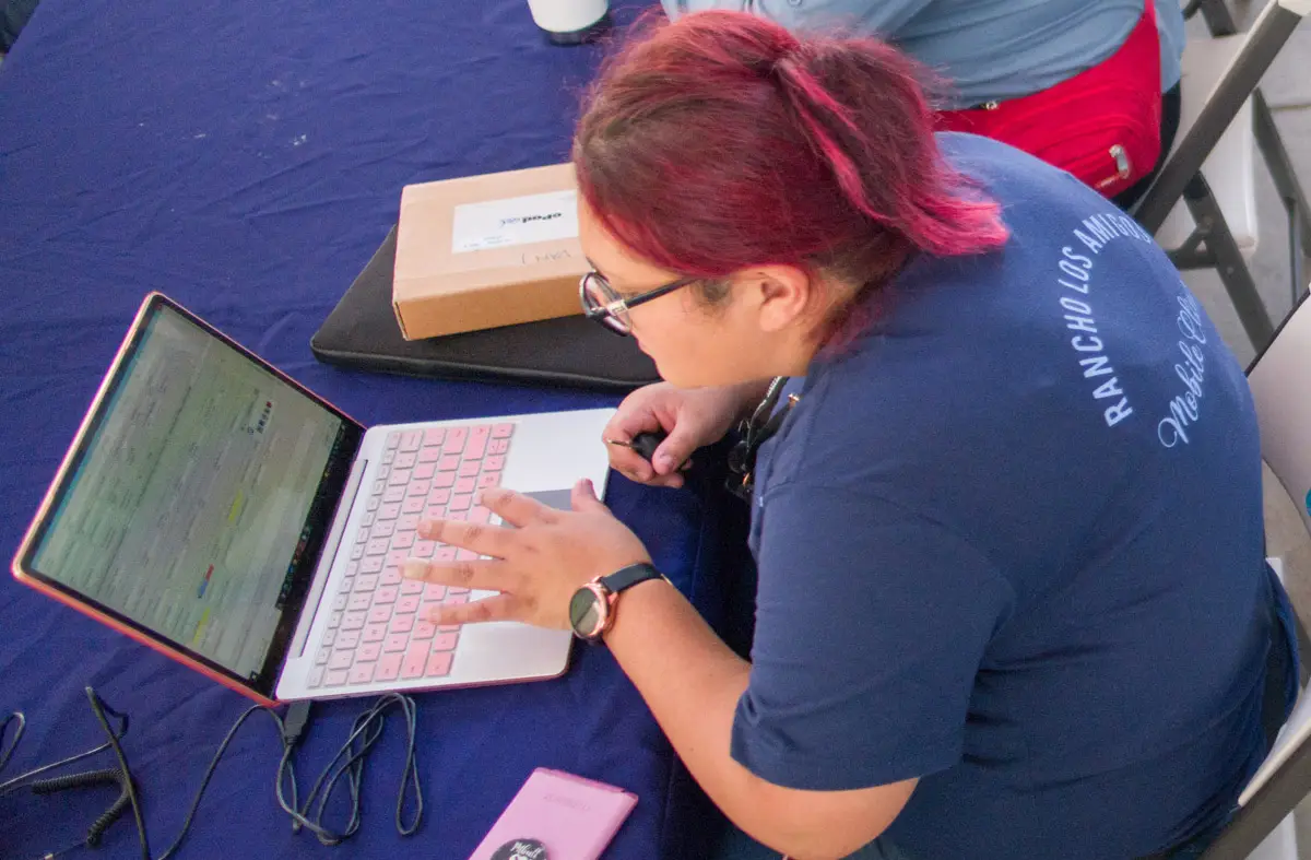 Team member working on a computer